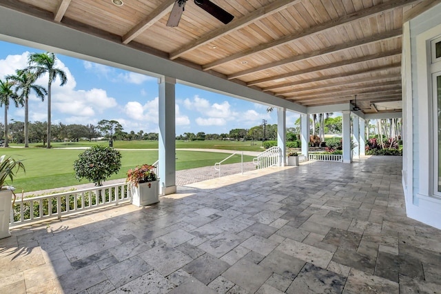 view of patio featuring ceiling fan