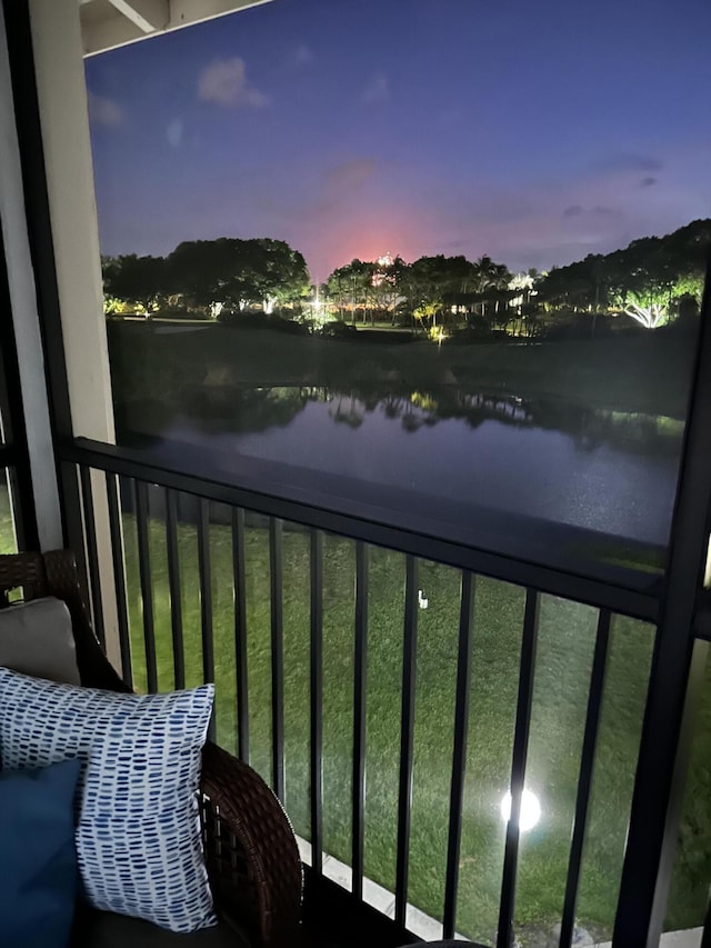 balcony at dusk with a water view