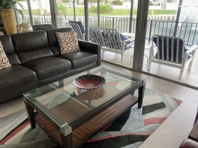 living room with tile patterned flooring