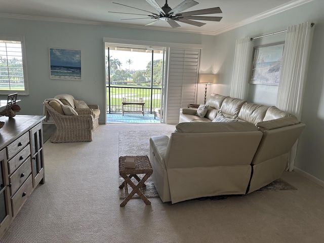 living room featuring light carpet, crown molding, and ceiling fan