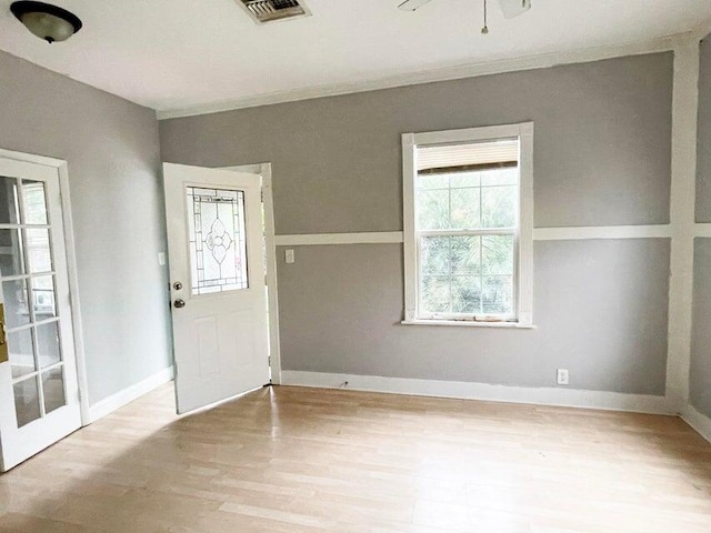 foyer featuring light hardwood / wood-style flooring and ceiling fan