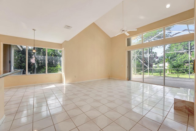 unfurnished room featuring ceiling fan, high vaulted ceiling, and light tile patterned floors