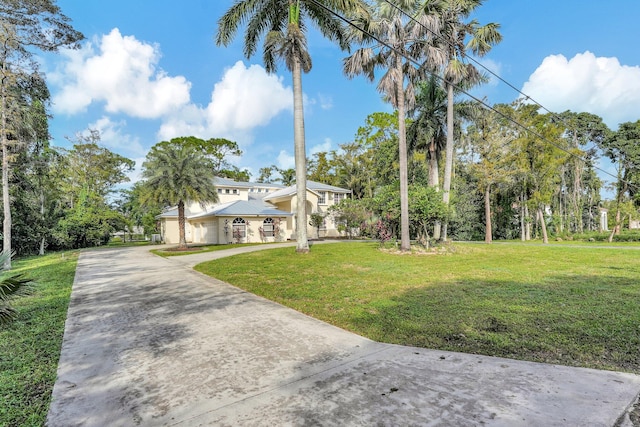 view of front of home with a front lawn