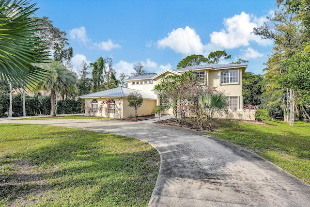 view of front of home featuring a front lawn