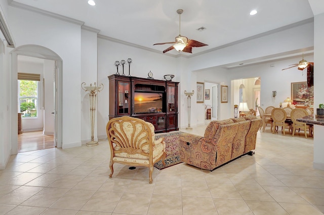 tiled living room featuring ornamental molding