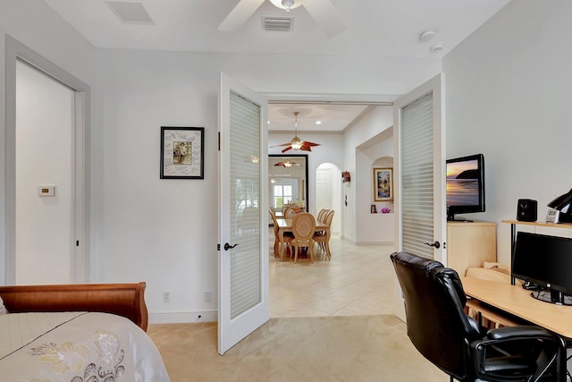 carpeted bedroom with ceiling fan