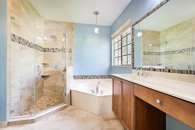 bathroom featuring plus walk in shower and vanity