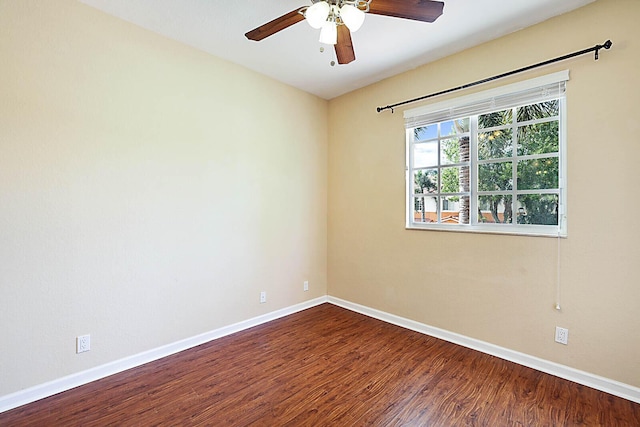 spare room featuring ceiling fan and hardwood / wood-style floors