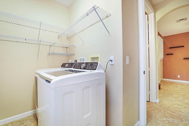 laundry area featuring washing machine and dryer