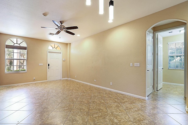 spare room featuring ceiling fan