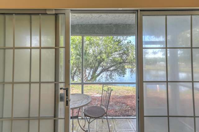 entryway featuring a water view