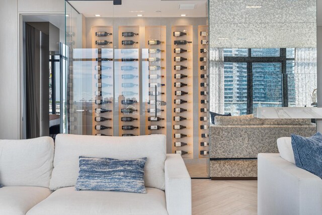 wine room with a wealth of natural light and parquet floors