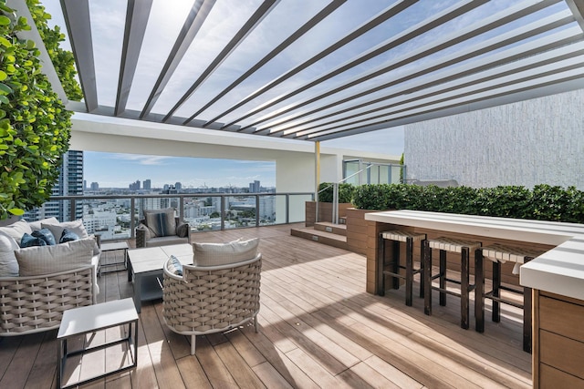 wooden deck featuring an outdoor living space, exterior bar, and a pergola