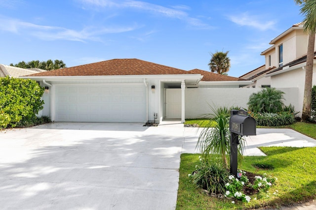 view of front of home with a garage