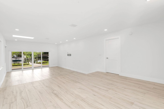 empty room featuring light hardwood / wood-style floors