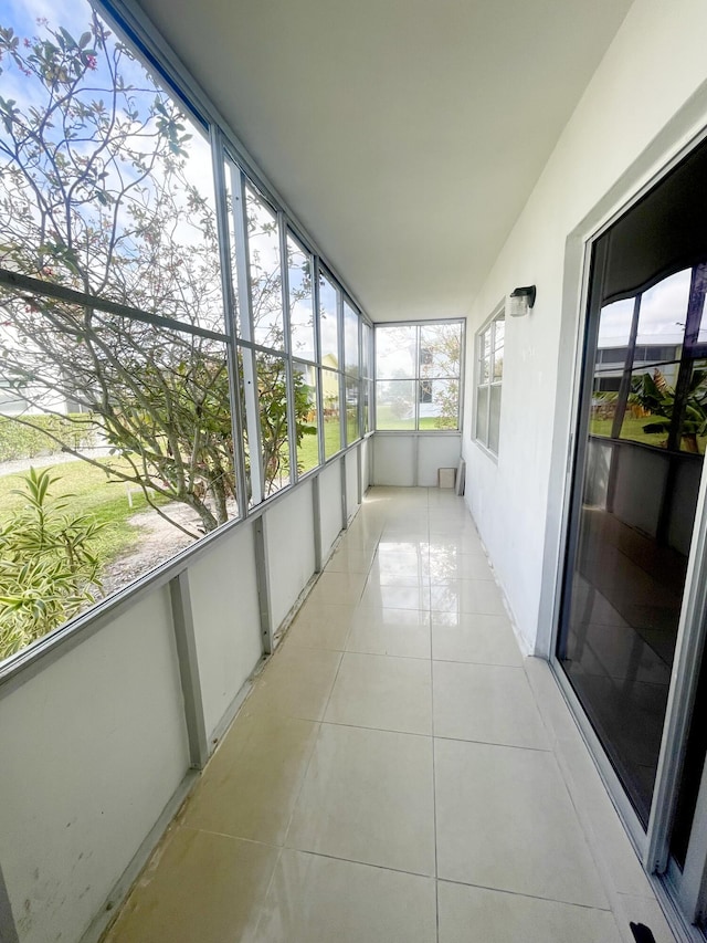 unfurnished sunroom featuring radiator