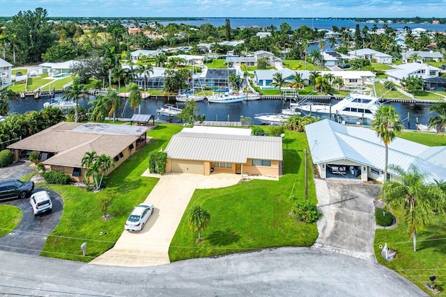 drone / aerial view featuring a water view