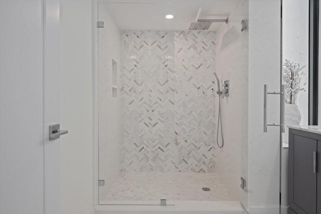 bathroom with vanity and an enclosed shower