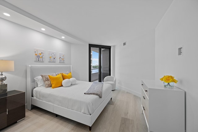 bedroom featuring light hardwood / wood-style flooring