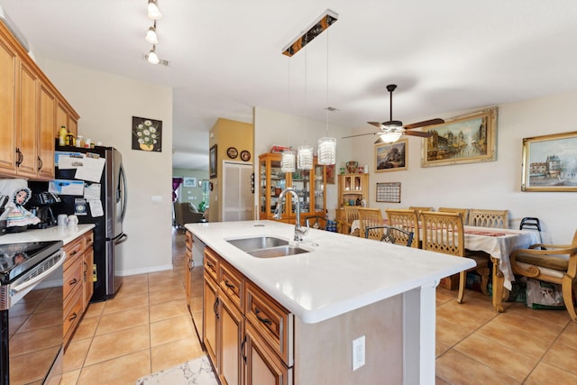 living room featuring light tile patterned floors and ceiling fan