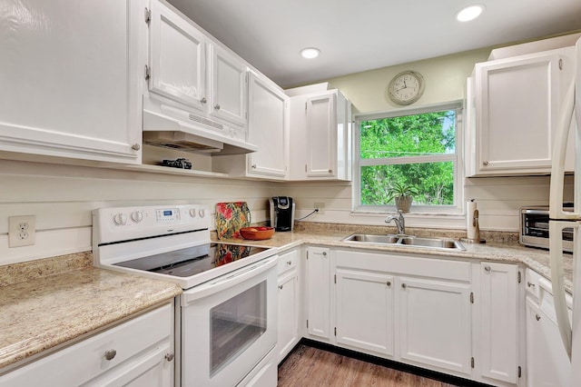 kitchen featuring dark hardwood / wood-style floors, white cabinets, sink, and white range with electric cooktop