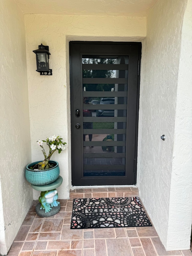 doorway to property with beverage cooler