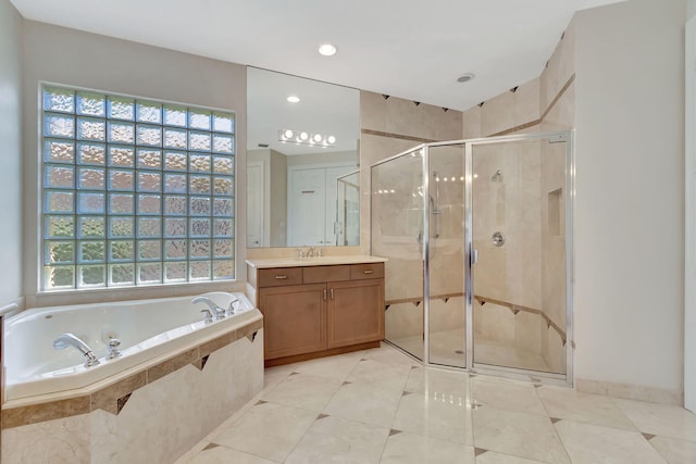 bathroom featuring vanity, tile patterned floors, and independent shower and bath