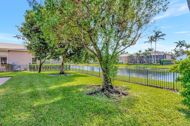 view of yard with a water view