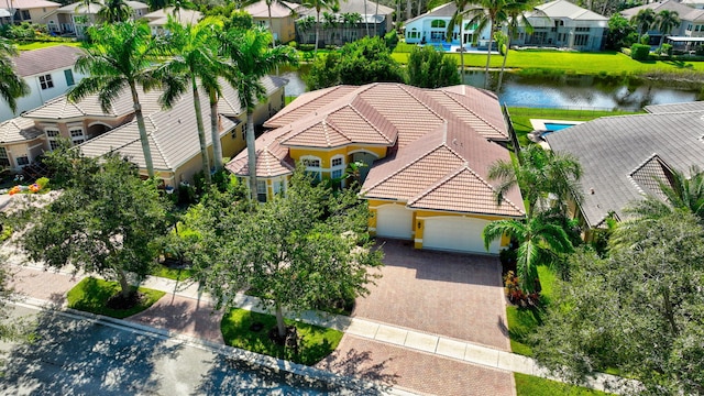 bird's eye view with a water view