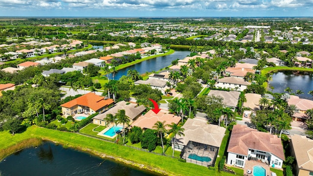 drone / aerial view with a water view