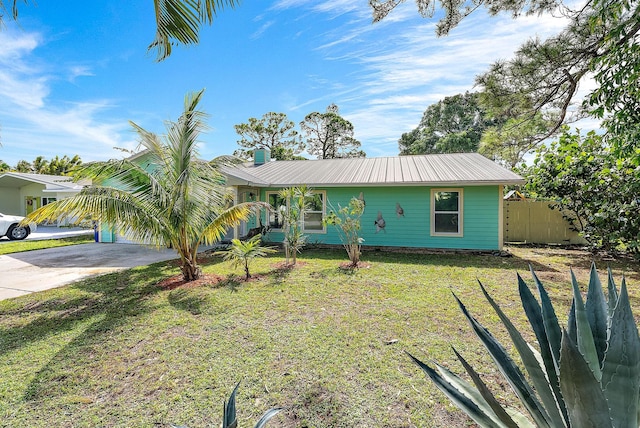 single story home featuring a front yard