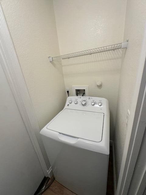 washroom with washer / clothes dryer