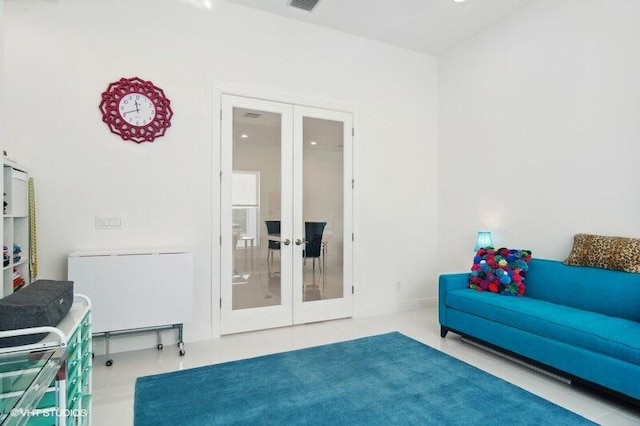 sitting room featuring french doors