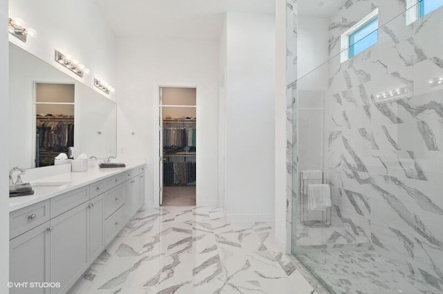 bathroom featuring vanity and a shower