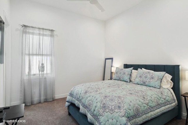 carpeted bedroom featuring ceiling fan