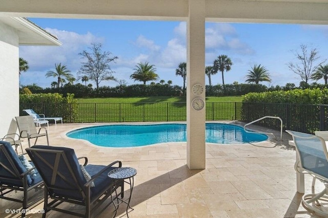 view of pool featuring a patio area