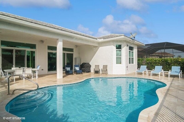 view of pool with a patio area