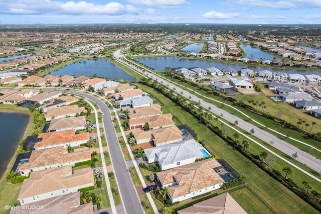 bird's eye view with a water view