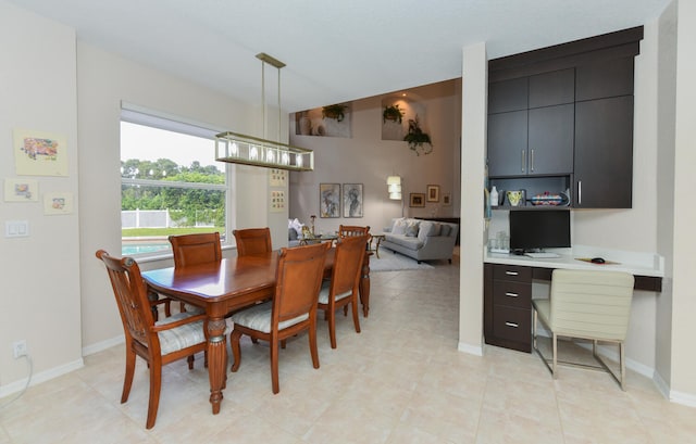 tiled dining space with built in desk