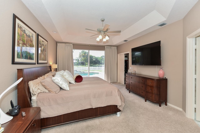 carpeted bedroom featuring access to outside and ceiling fan