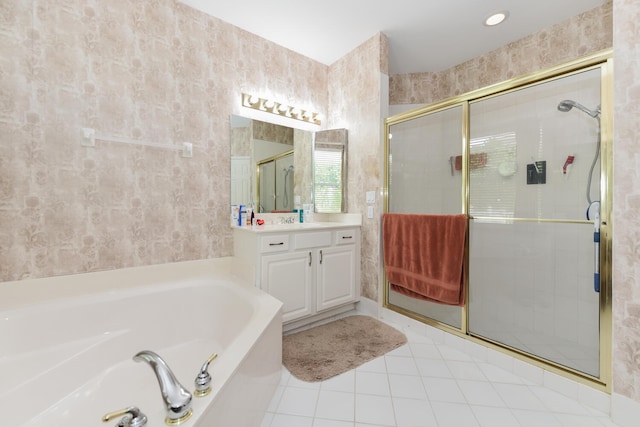 bathroom with vanity, tile patterned floors, and separate shower and tub