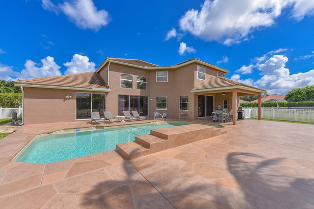 view of pool featuring a patio area