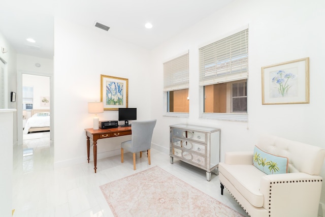 office space with visible vents, recessed lighting, and baseboards