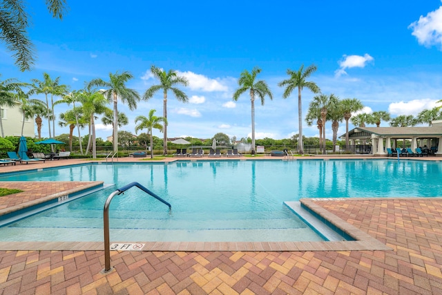 community pool with a patio