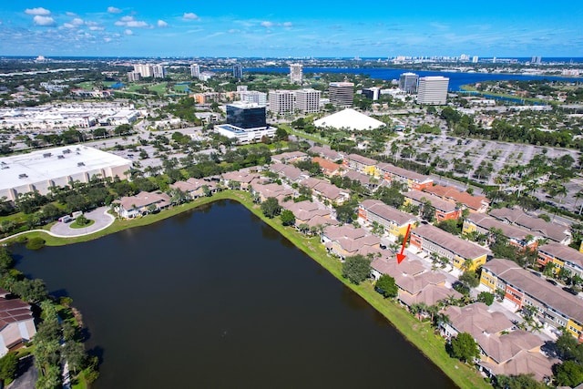 drone / aerial view with a view of city and a water view