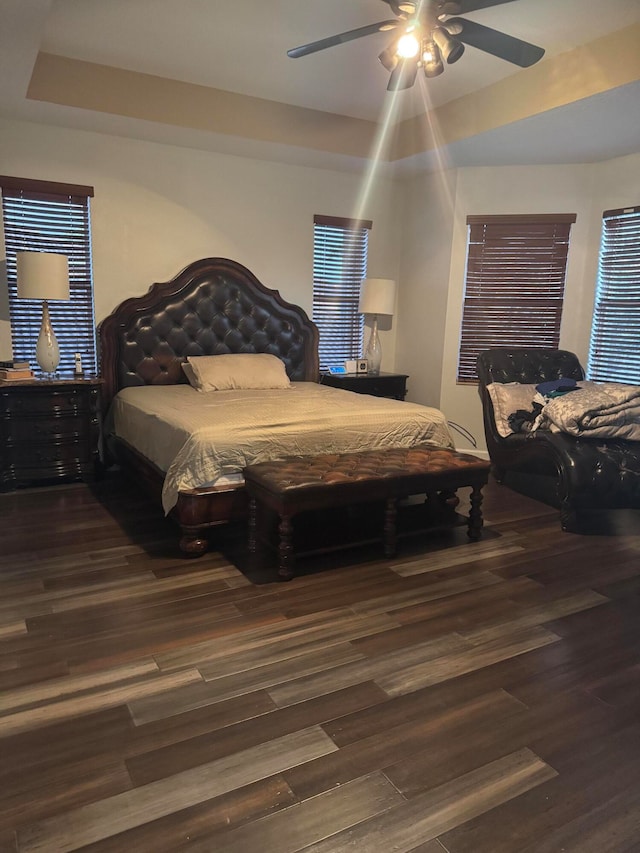 bedroom featuring ceiling fan and wood-type flooring