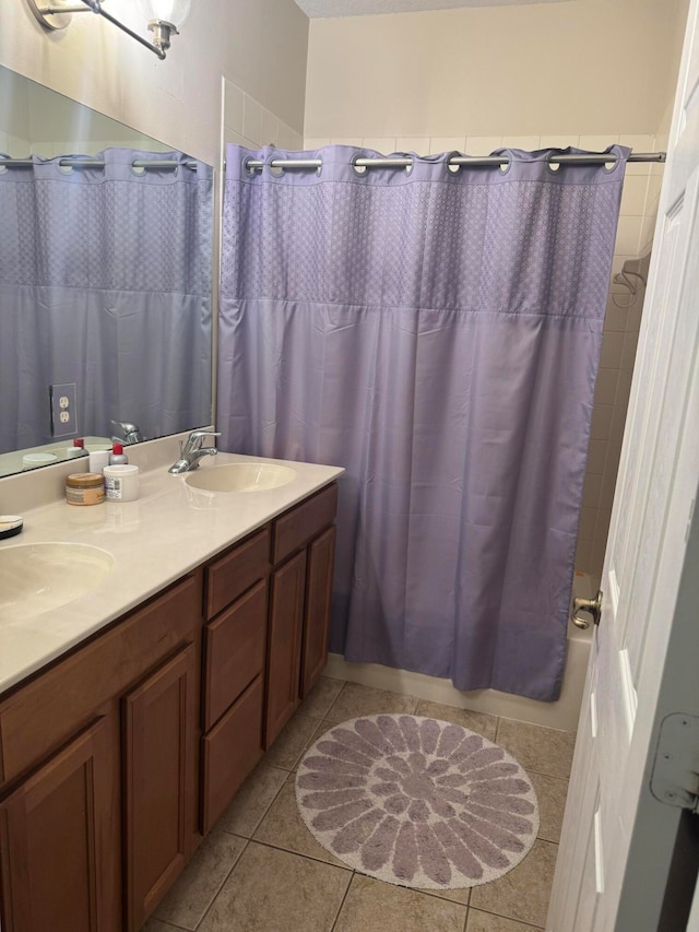 bathroom with tile patterned floors, vanity, and shower / tub combo with curtain