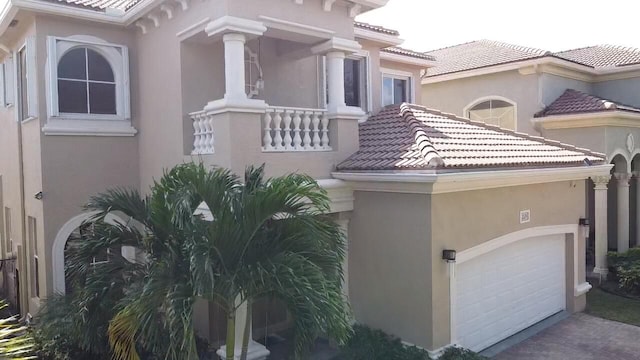 view of property exterior featuring a garage