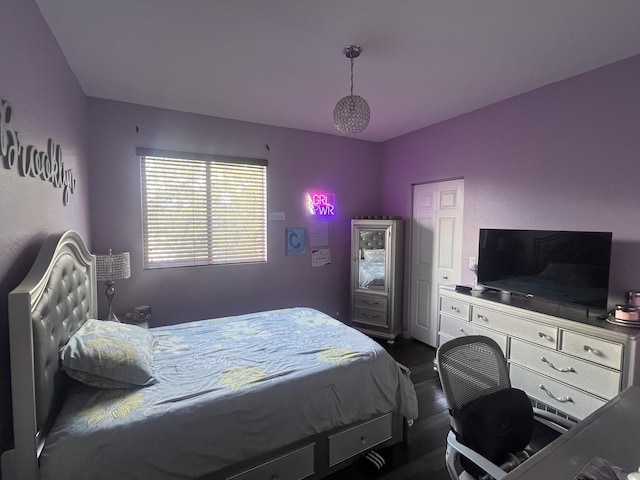 bedroom featuring dark hardwood / wood-style floors