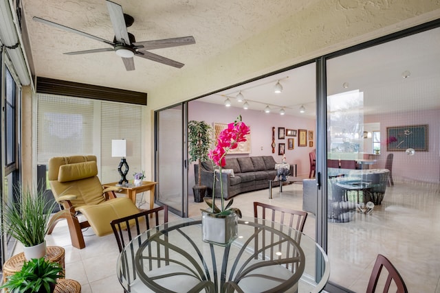 interior space featuring ceiling fan